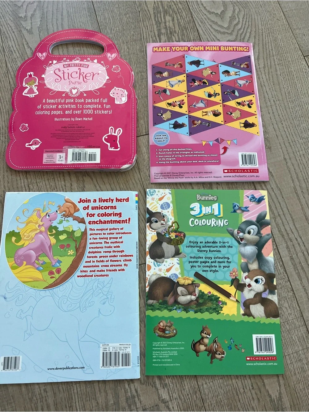 4 coloring books - 2 x Disney, 1 x Unicorns, 1 x Pink Purse.